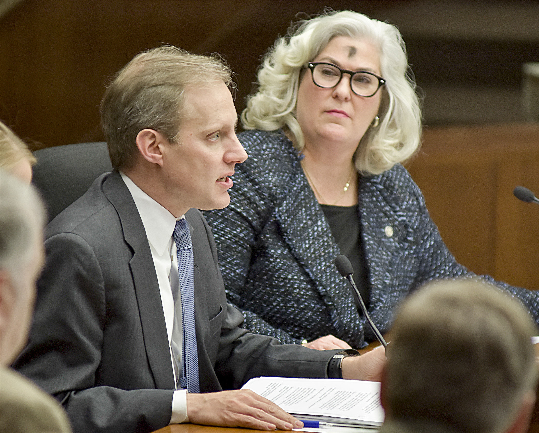 Secretary of State Steve Simon testifies before the House Government Operations and Elections Policy Committee March 1, Ash Wednesday, in support of a bill sponsored by Rep. Kelly Fenton, right, that would change the state primary from August to June. Photo by Andrew VonBank